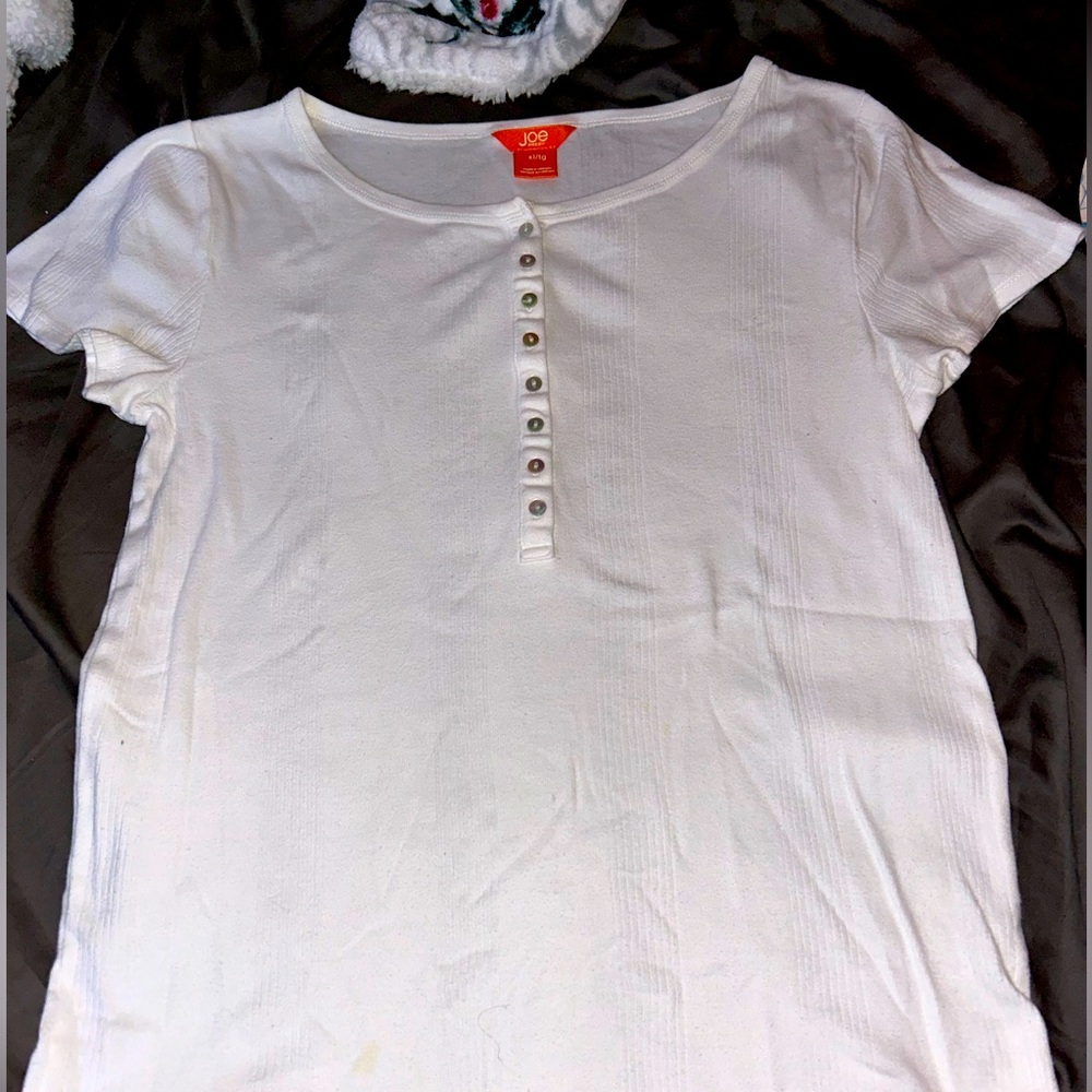 This is a women’s basic white T-Shirt
